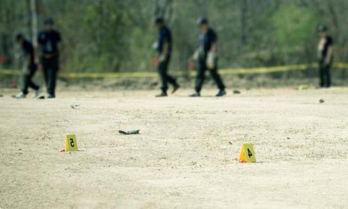 Team of Investigators Analyzing Scene of Accident 